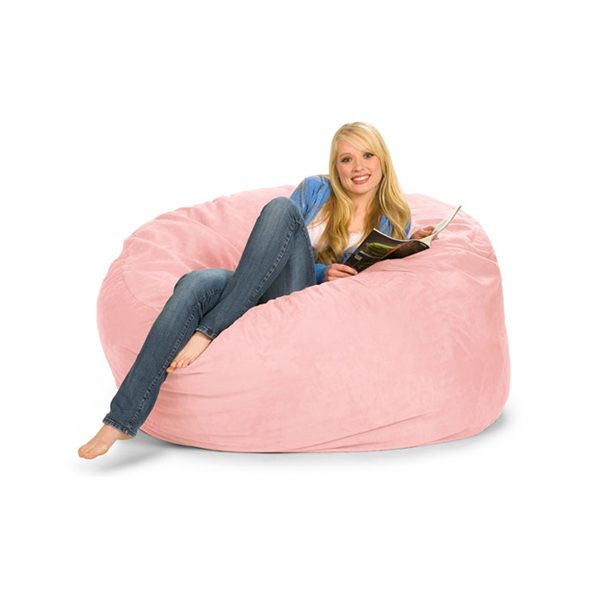 A girl reading on a bean bag