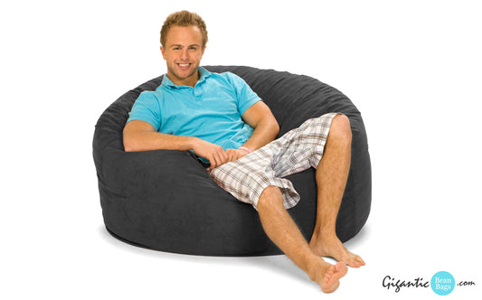 Our 4 ft. Gray Bean Bag Chair with a guy on it.
