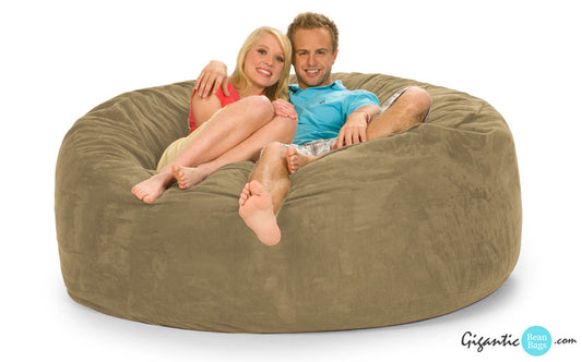 A 6 ft. bean bag chair in beige color.