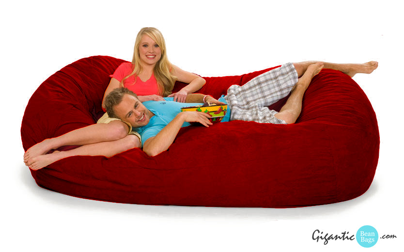 Here we have our 7.5 ft long oval bean bag lounger. This picture shows us the red microsuede cover.