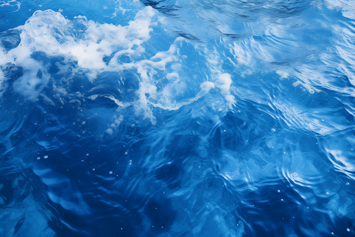 A beautiful overheat shot of blue ocean waves, representing the cool vibrant color of this blue bean bag collection.