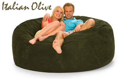 Italian Olive 6 ft Bean Bag Chair with a man and woman on it.