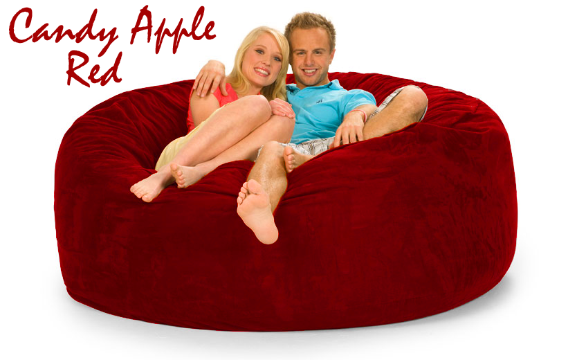 Candy Apple Red 6 ft Bean Bag Chair with a man and woman on it.